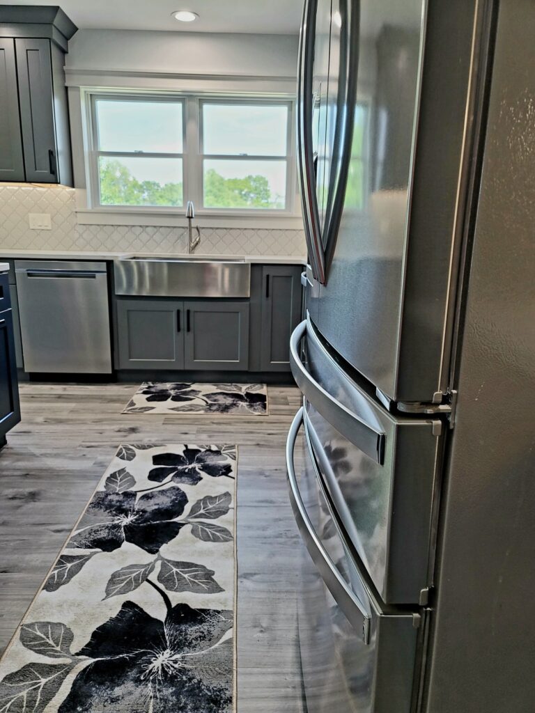 Shaker-Gray-Kitchen-Cabinets-with-Stainless-Farm-House-Sink-Big-Rapids-Michigan
